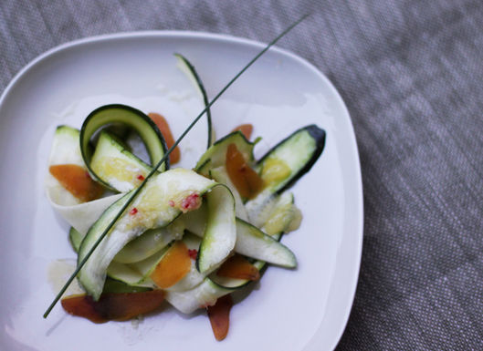 Raw zucchini and bottarga with lemon and daikon dressing