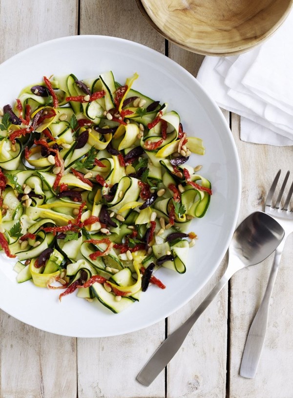 Raw zucchini salad with olive dressing