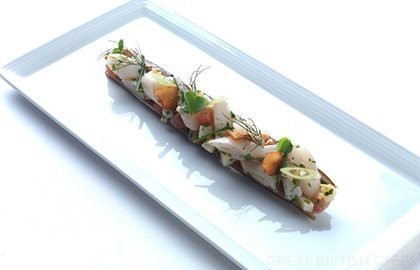 Razor clams with spring onions and almond