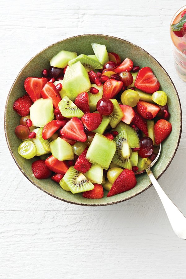 Red-and-green fruit salad with mint syrup