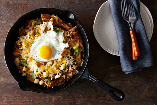 Red chilaquiles with fried eggs