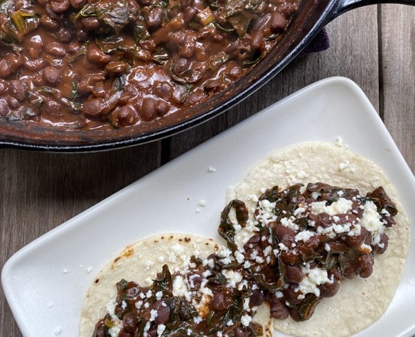 Red chile beans and greens (Frijoles y quelites con chile rojo)