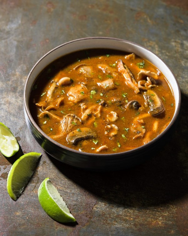 Red chili soup with mixed mushrooms