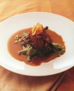 Red-cooked quail breasts with quail larp, chilli and eggplant salad and fried garlic