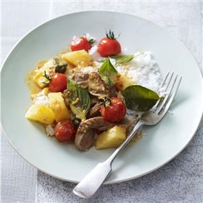 Red duck curry with cherry tomatoes and pineapple