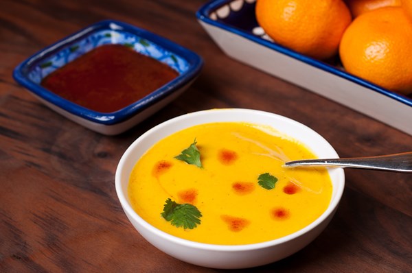 Red lentil and kabocha squash soup with harissa oil