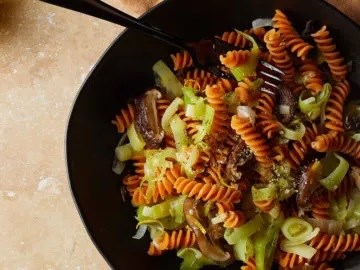 Red lentil rotini with silken leeks and shiitakes