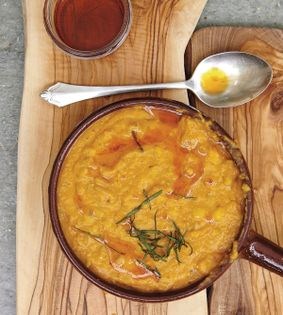 Red lentil soup with spicy aromatic basil oil