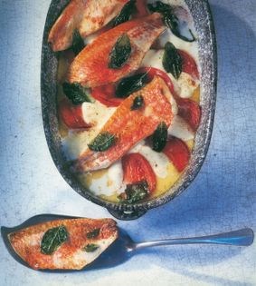 Red mullet on baked salad Caprese with basil & olive oil