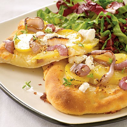 Red onion, potato, and goat cheese pizza