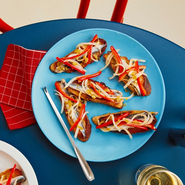 Red pepper-anchovy toasts
