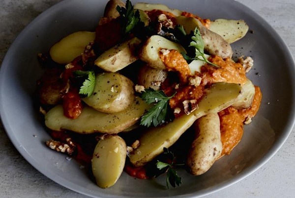 Red pepper rouille on kipflers with toasted walnuts