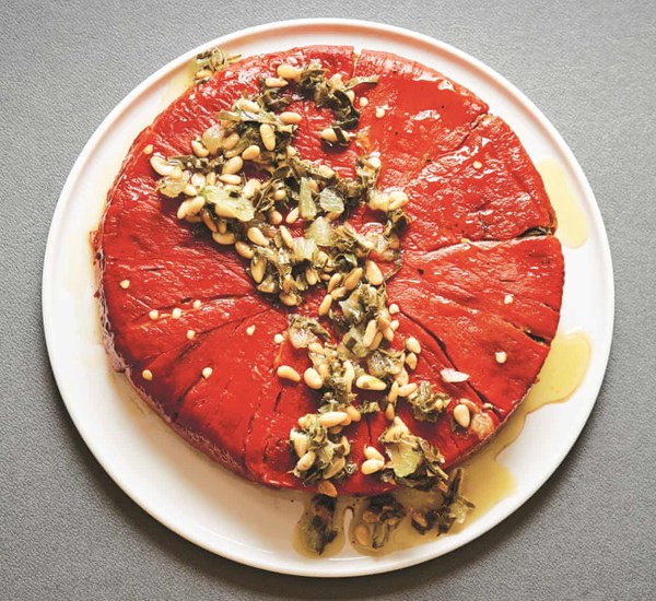 Red pepper, vine leaf and goat's cheese dolma cake