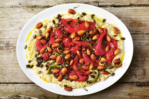 Red pepper with smashed white beans, roasted nuts and pumpkin seeds
