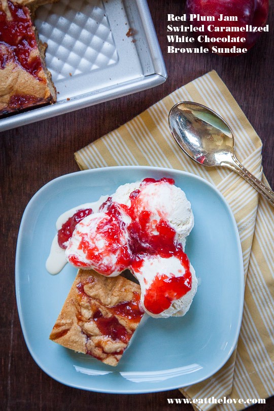 Red plum jam swirled caramelized white chocolate brownie sundae