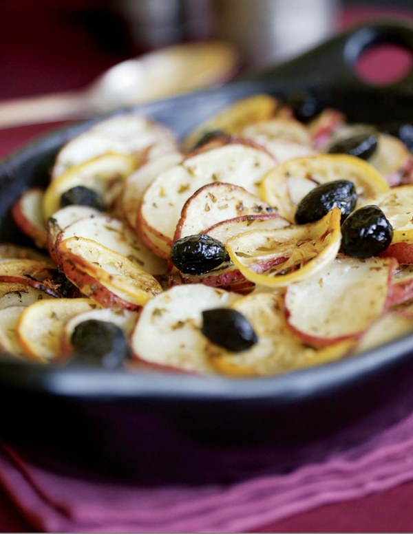 Red potato slices with lemon and olives
