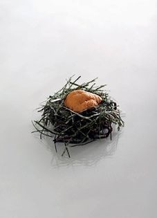 Red sea urchin roe with slow-cooked egg yolk, smoked miso eggplant and hijiki seaweed