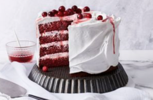 Red velvet and cranberry cake with meringue frosting