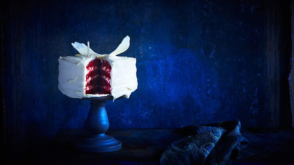 Red velvet layer cake with fresh raspberries and mascarpone icing