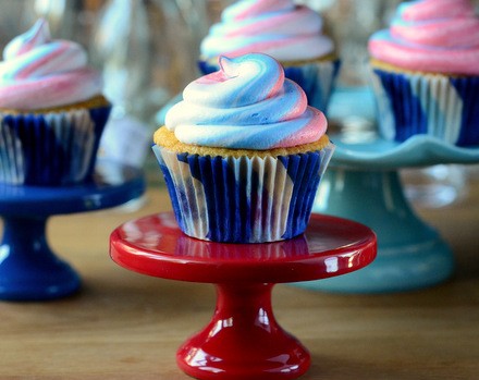 Red, white and blueberry cupcakes with swirled frosting