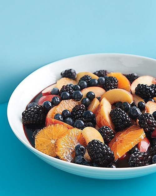 Red-wine-macerated peaches, berries, and oranges