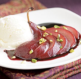 Red-wine-poached pears with star anise & pistachios