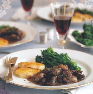 Redcurrant venison Bourguignon with spring onion potato cakes