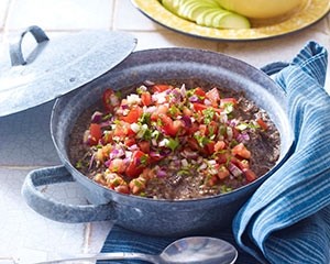 Refried black beans with pico de gallo