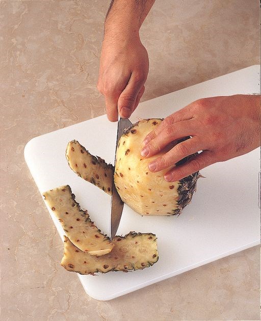 Removing pineapple skin