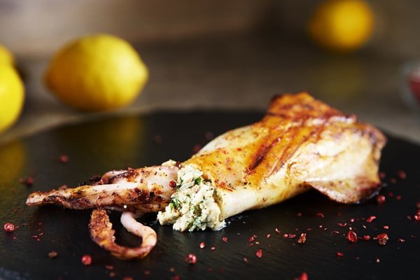 Retro feta-stuffed grilled calamari (Kalamari psito me feta)