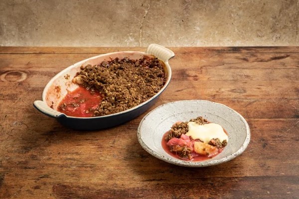 Rhubarb and apple crumble with cardamom custard and hazelnut praline