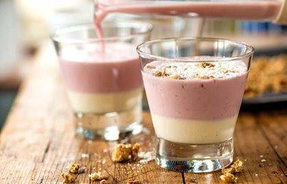 Rhubarb smoothie topped with custard and granola