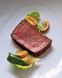 Rib eye roast with chestnuts and Brussels sprout leaves