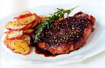 Rib-eye steak au poivre with balsamic reduction