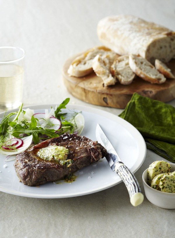 Rib-eye steak with mustard and parsley butter