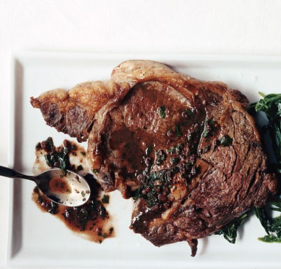 Rib-eye steaks in red wine sauce