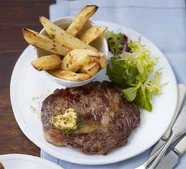 Rib-eye steaks with chilli butter & chips