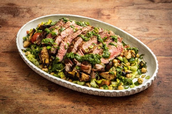 Ribeye steak and grilled artichoke salad with chimichurri