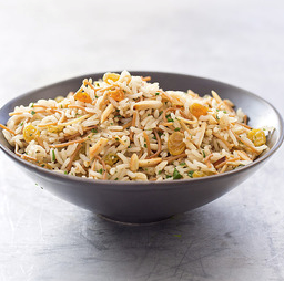 Rice and pasta pilaf with golden raisins and almonds