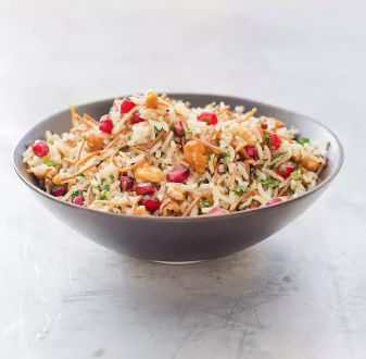 Rice and pasta pilaf with pomegranate and walnuts