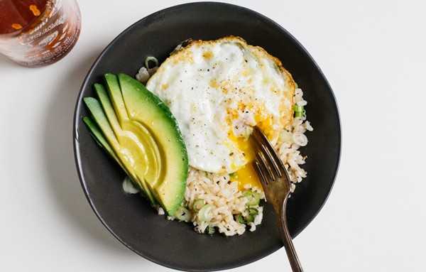 Rice bowl with fried egg and avocado
