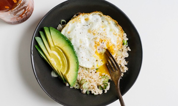 Rice bowl with fried egg and avocado