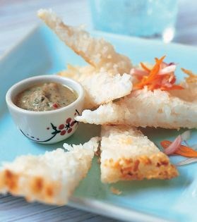 Rice cake with a prawn and coconut dip
