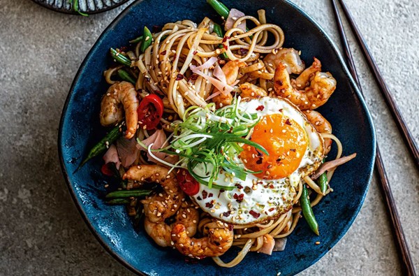 Rice noodles with prawns, dark soy sauce & sesame fried egg