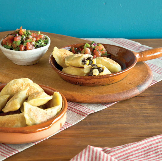 Rice pudding pierogies with cranberry compote