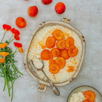 Rice pudding with apricot compote (Roz bi halib wal mish mash)