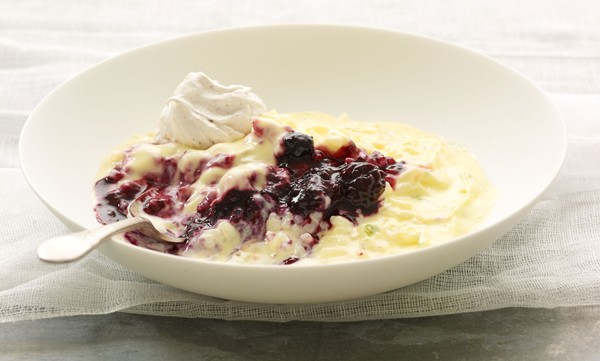 Rice pudding with cardamom meringues, lime crème Anglaise, and chunky mixed-berry coulis