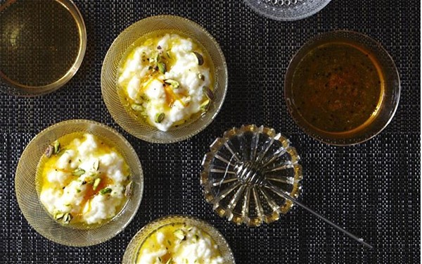 Rice pudding with honey, orange and cardamom syrup