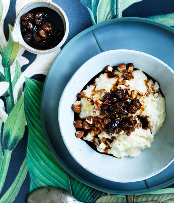 Rice pudding with raisins, almonds and coconut syrup