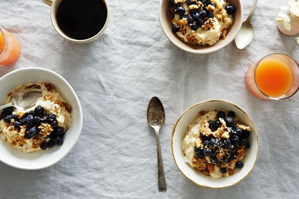 Rice pudding with sesame crumble and blueberries